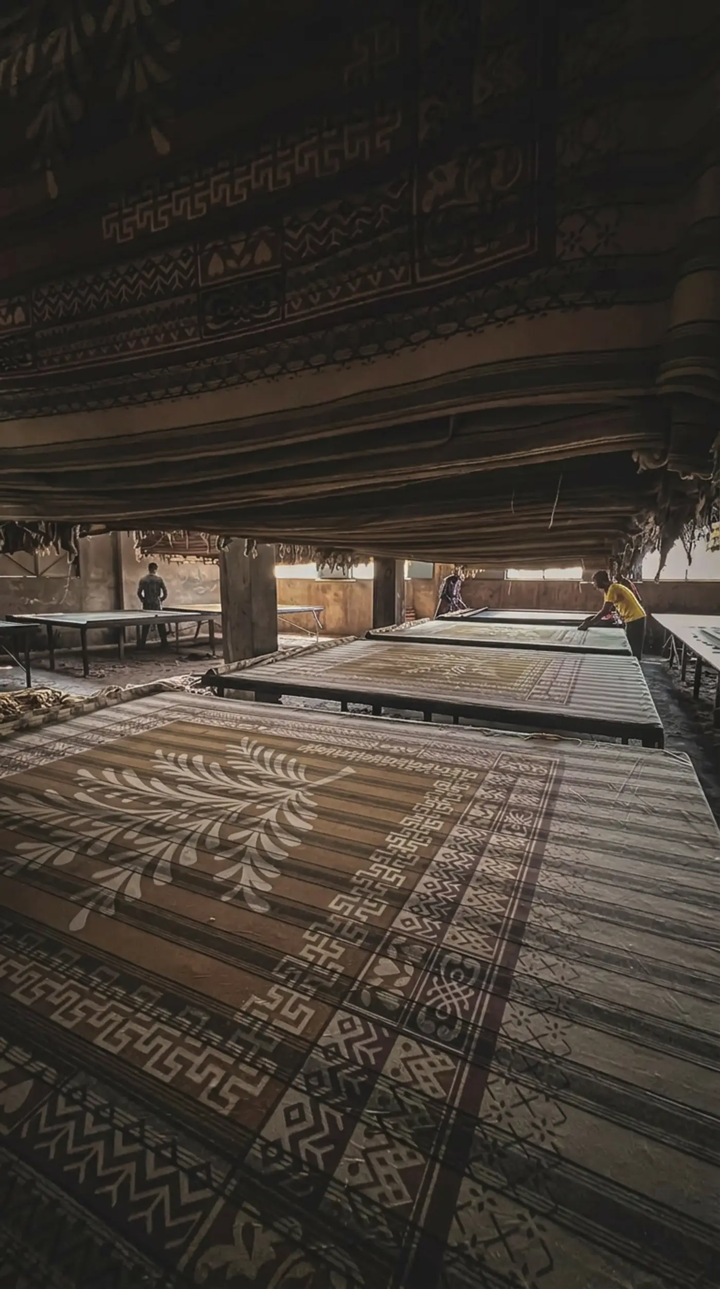 Hand block printing manufacturing workshop with traditional bedsheet designs